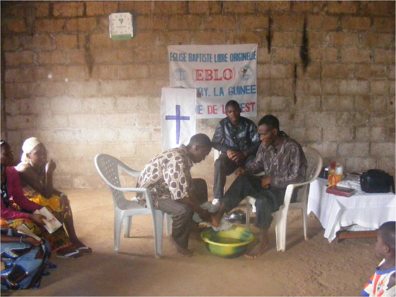 Feet washing service in Guinea