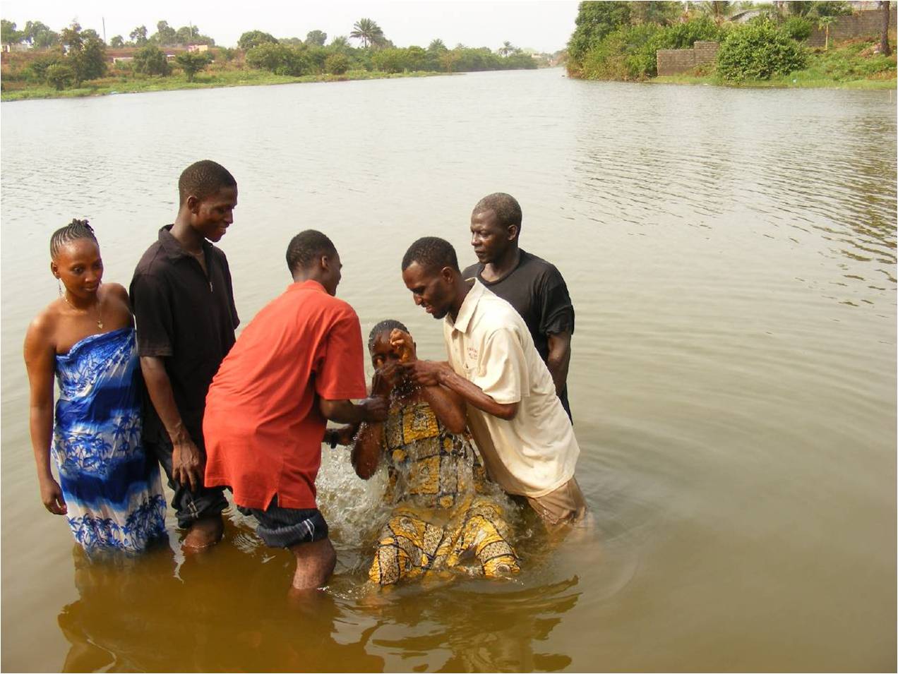 Baptizing in Guinea